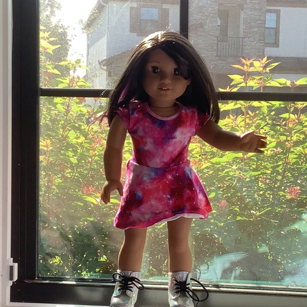 Lucian American girl doll with complete og outfit and another outfit.